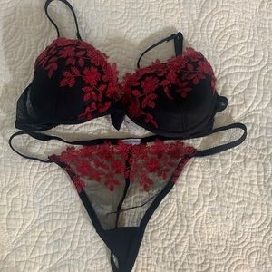 Black underwire Demi bra with red embroidery size 34BB